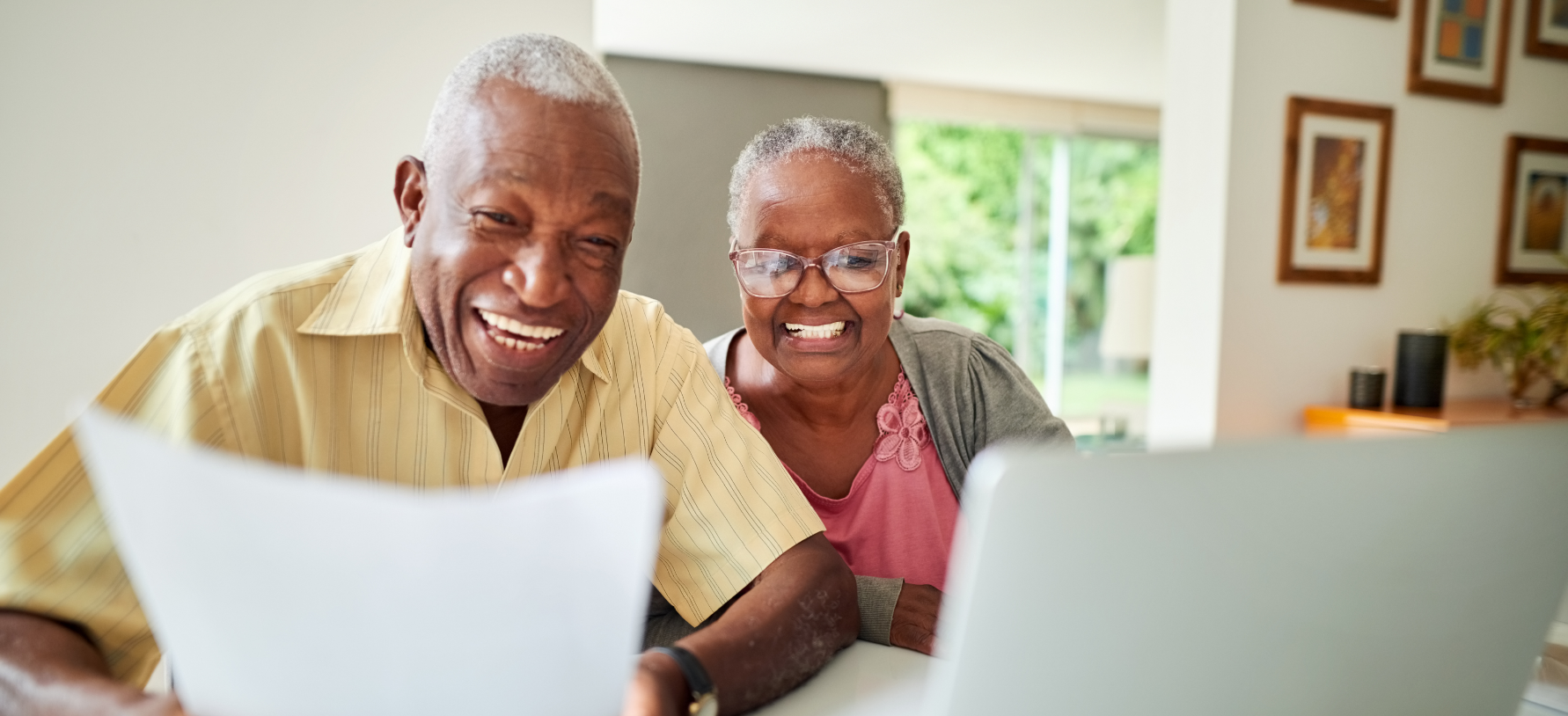 Happy couple planning their retirement together